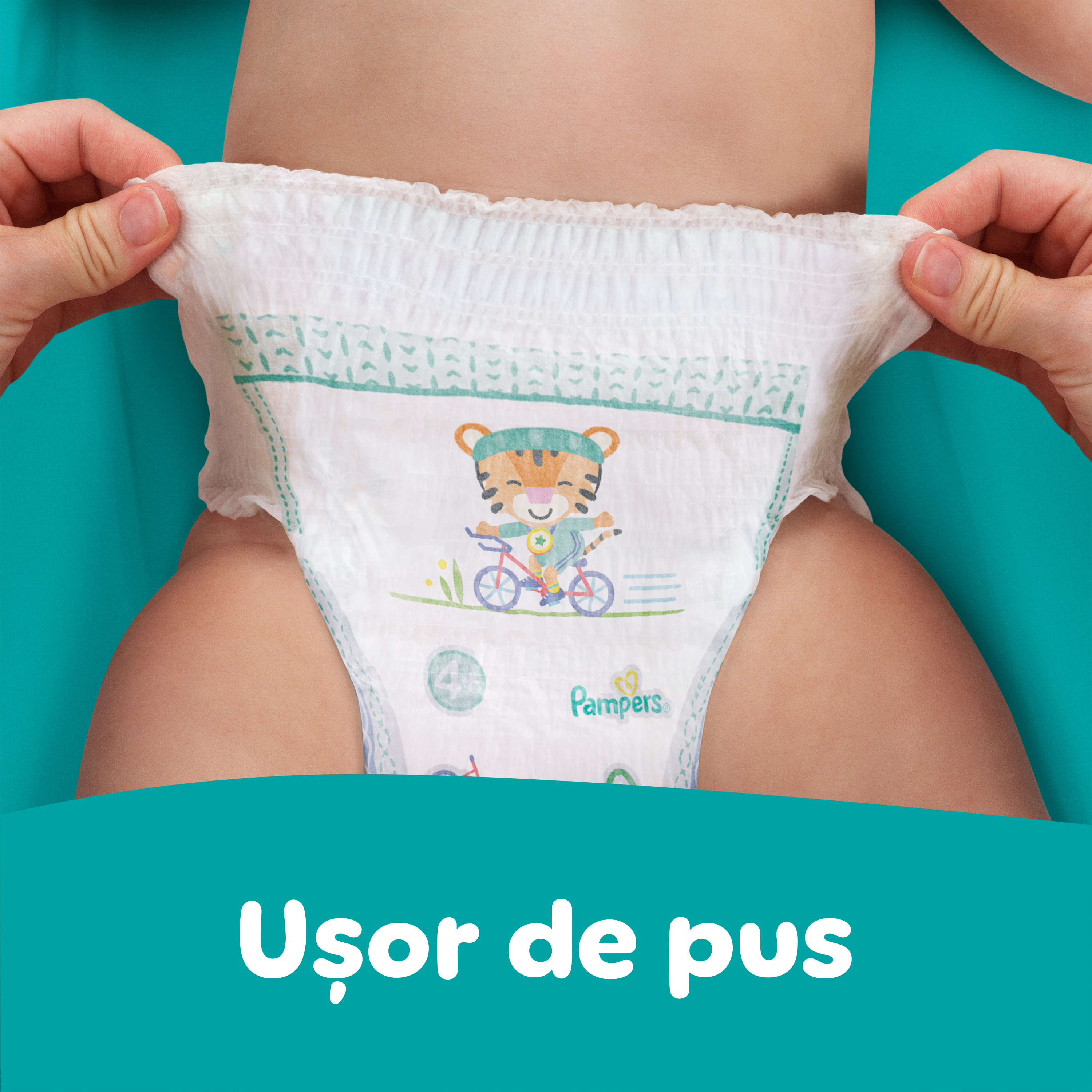 Imagine în care se arată cât de ușor se pune scutecul printr-o singură tragere.