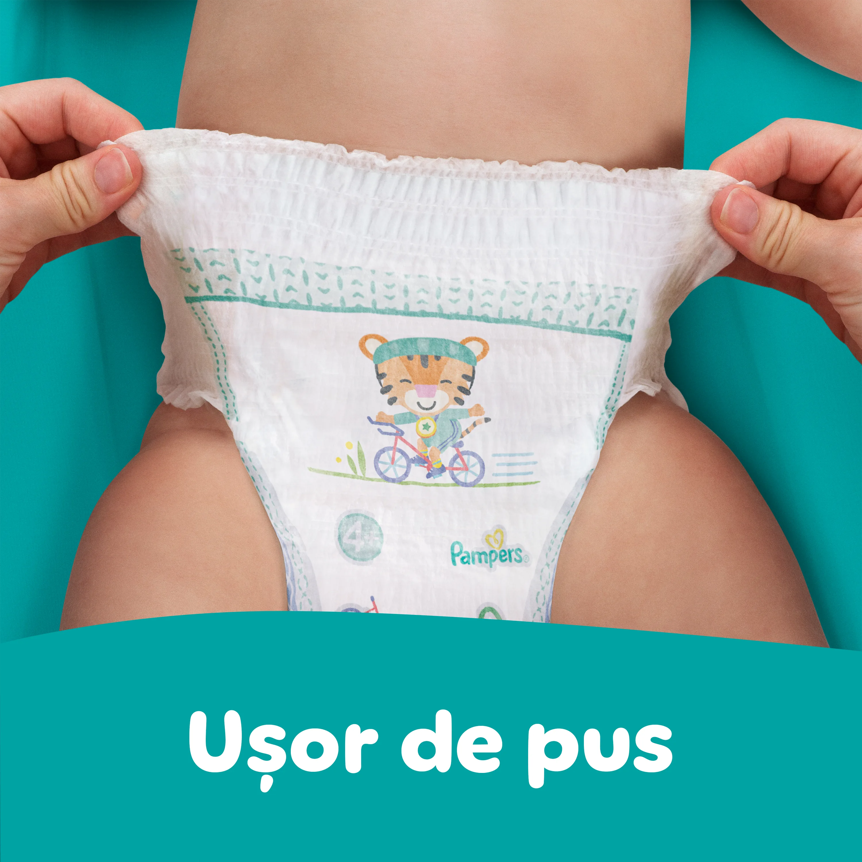 Imagine în care se arată cât de ușor se pune scutecul printr-o singură tragere.