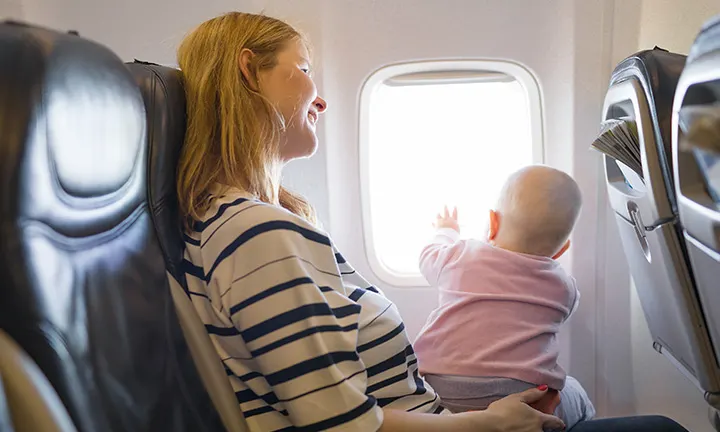 Mother Flying with a Baby