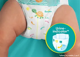 Pijl wijst naar de urine-indicator op de luier