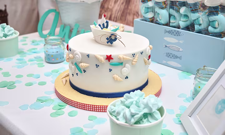 Nautical sailboat baby shower cake