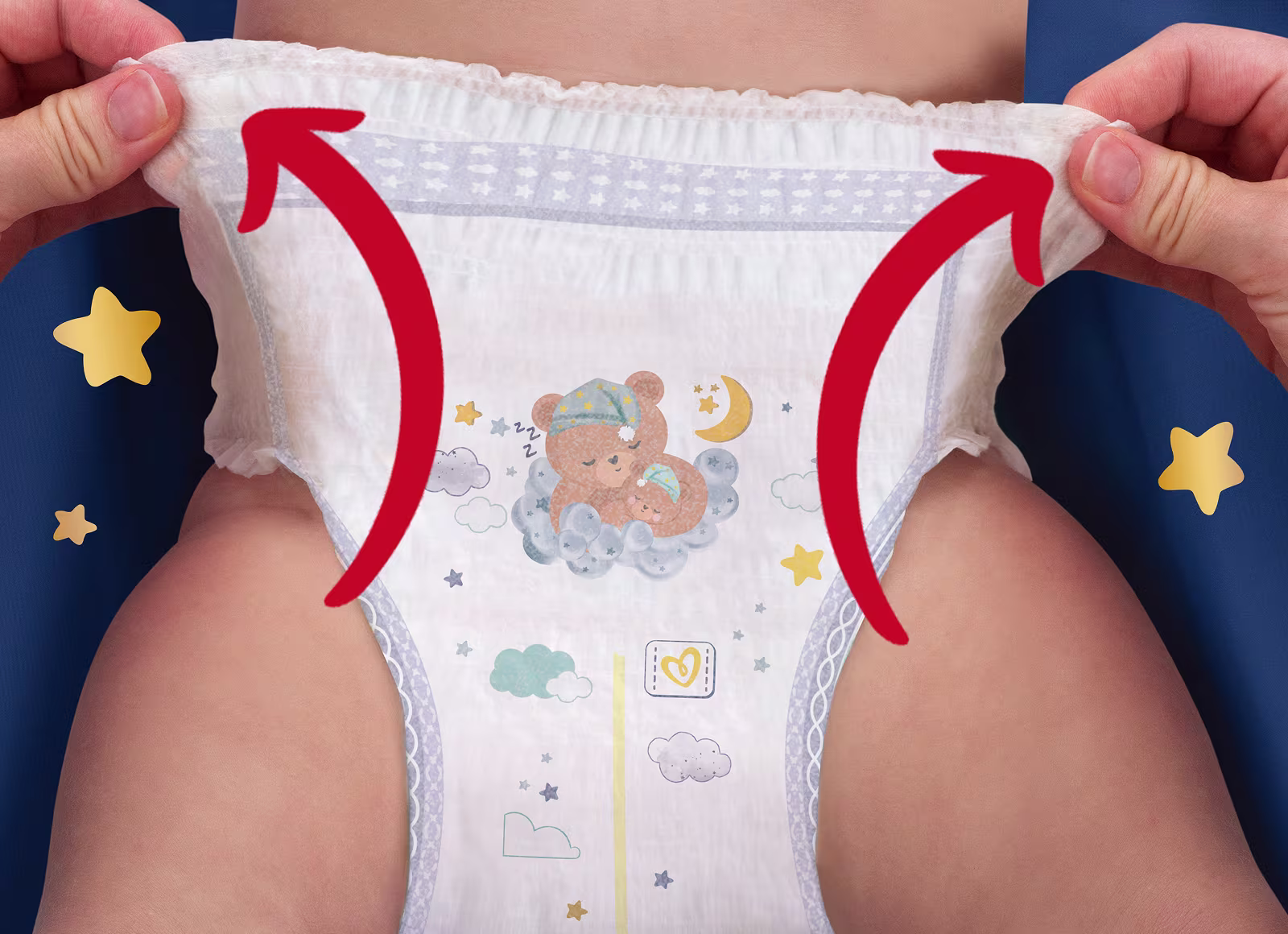 2 handen tonen hoe eenvoudig het is om de Pampers® Night Pants aan te trekken
