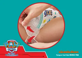 Couche-culotte de nuit que l'on retire en déchirant les côtés.