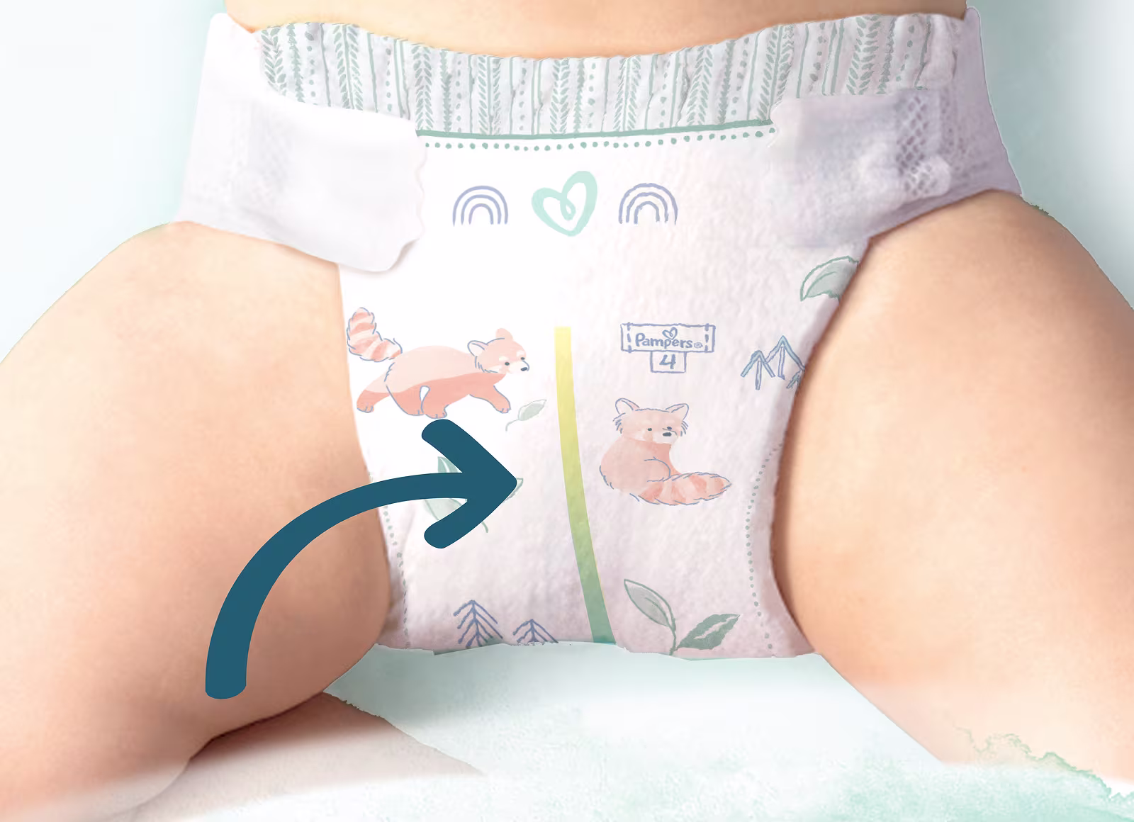Een blauwe pijl wijst naar de urine-indicator van de Pampers Harmonie luier.