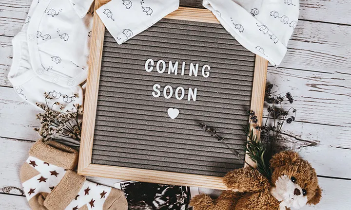 Coming soon letterboard pregnancy announcement idea