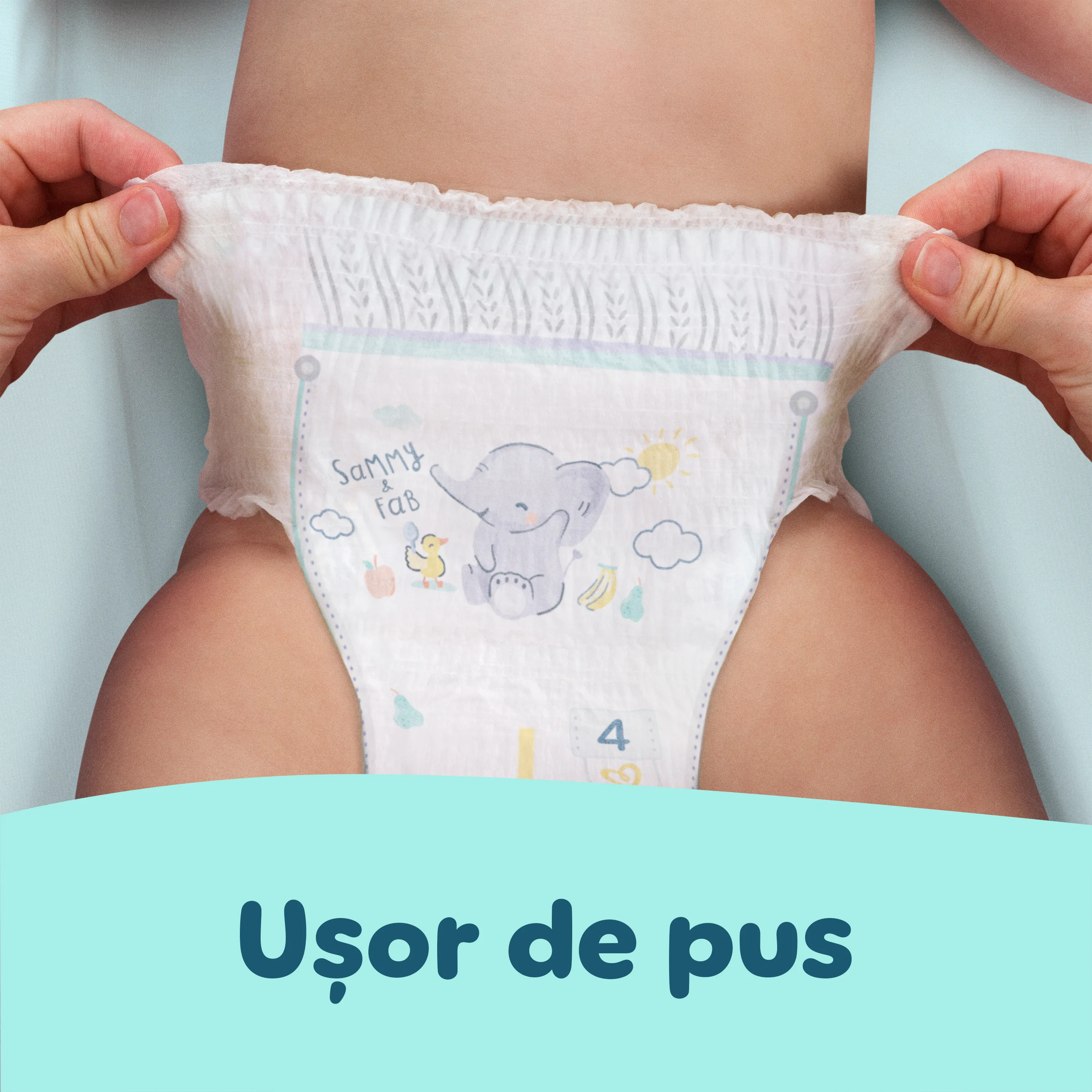 Imagine în care se arată cât de ușor se pune scutecul printr-o singură tragere.