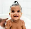 Banner Image of Toddler Bathing for Article on Toddler Bath Time