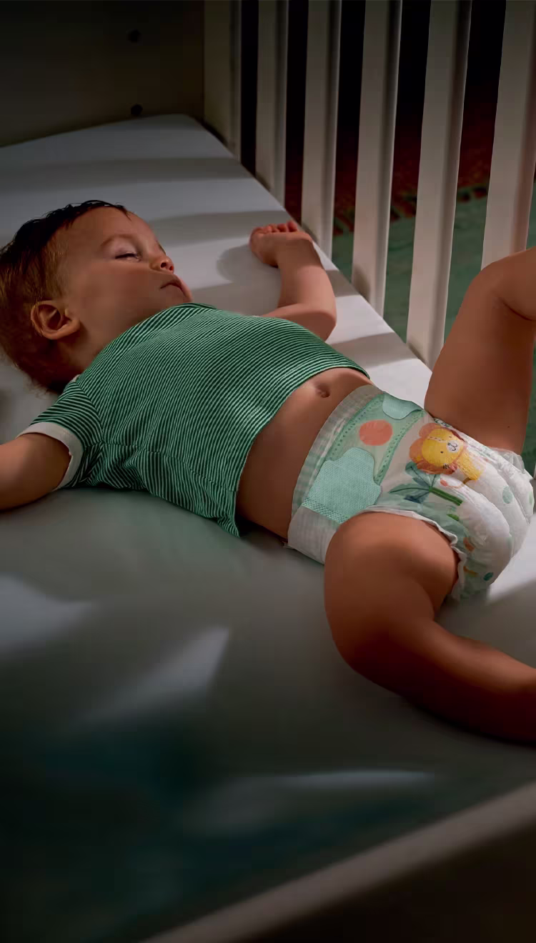 Imagen mostrando las Orejas Elásticas Cinta Flex en pañal Pampers Confort Sec.