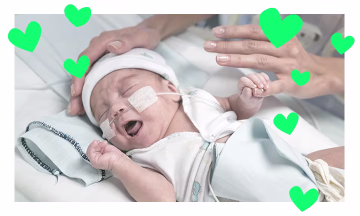 PREEMIE BABY IN AN INCUBATOR