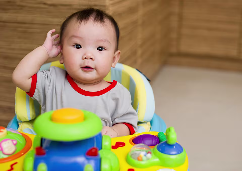 working from home with baby-Article Content Image 1 Baby in activity center