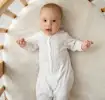 Baby lying in a basinet