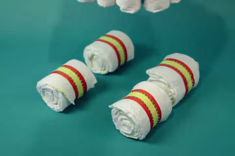 הכנת עוגת חיתולים שלב 5 הכנת עוגת חיתולים שלב 5