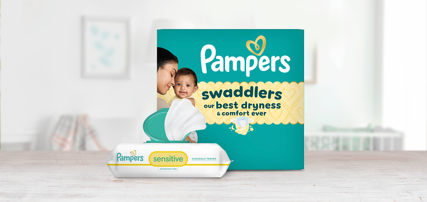 Pampers Swaddlers box with a smiling baby beside Pampers Sensitive wipes, highlighting gentle diapering and wipes for healthy baby skin.