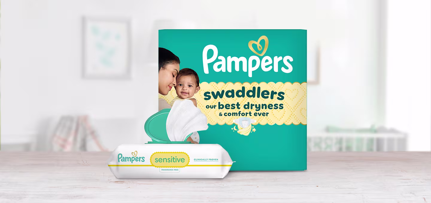 Pampers Swaddlers box with a smiling baby beside Pampers Sensitive wipes, highlighting gentle diapering and wipes for healthy baby skin.