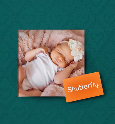 Baby laying on their back wearing a floral headband and white onesie with a Shutterfly card over top of the image to show the included gift Baby laying on their back wearing a floral headband and white onesie with a Shutterfly card over top of the image to show the included gift