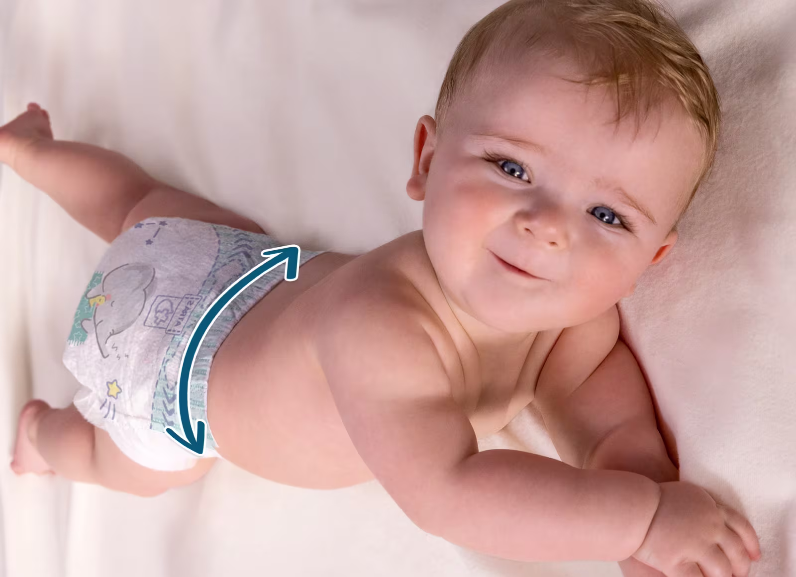 Hasta 100% Libre de Derrames e Irritaciones: Bebé con pañal en cama