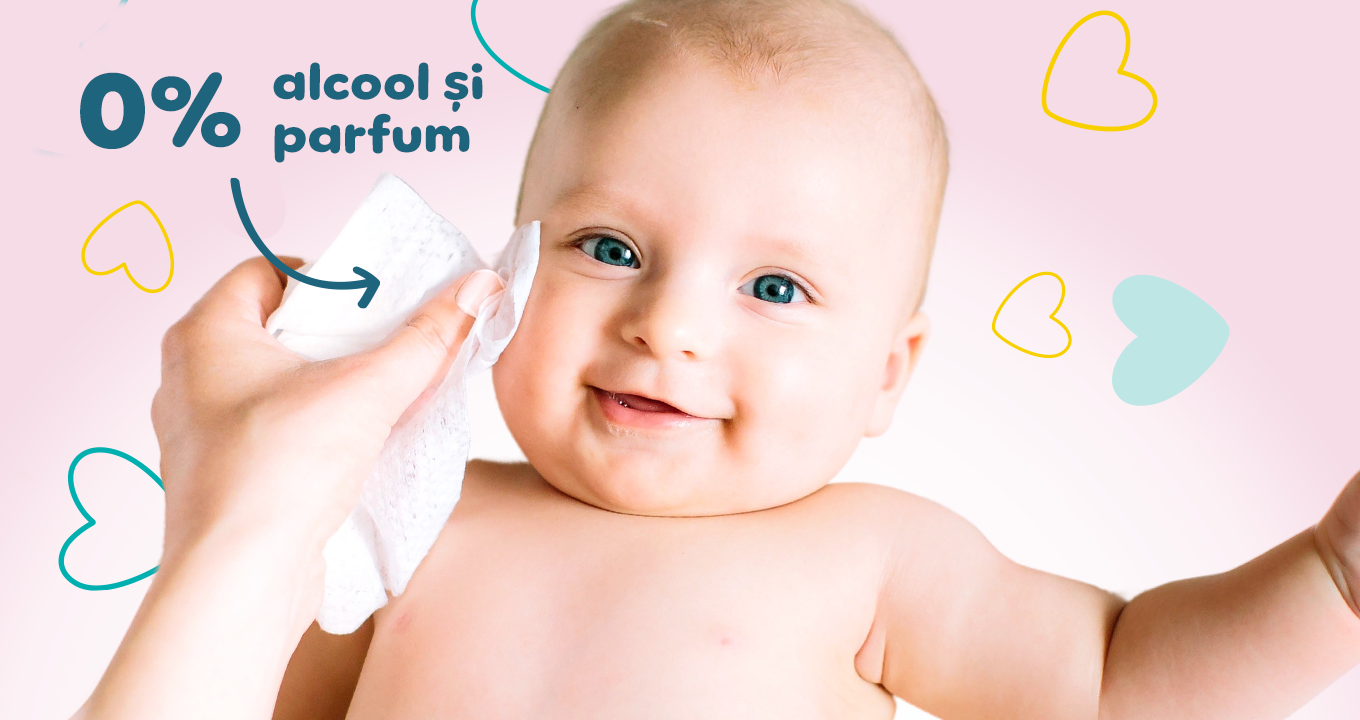 Imagine cu bebeluș pe fundal roz care este șters pe față cu șervețel Pampers și scris 0% alcool și parfum.