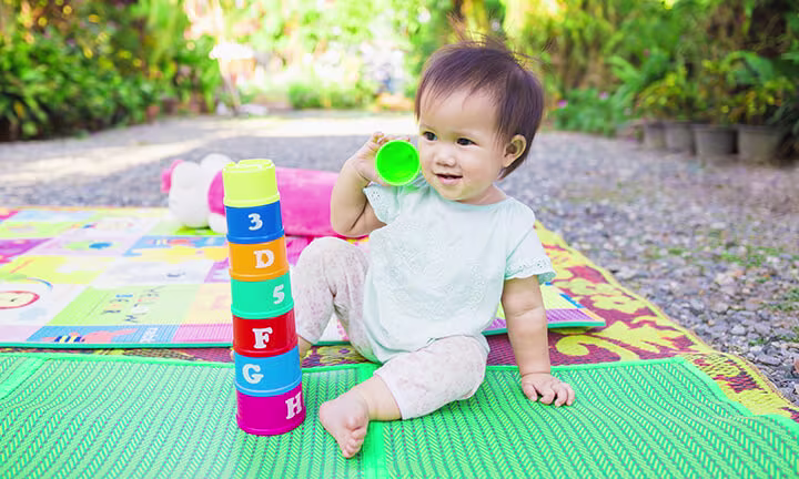 Baby playing outdoors