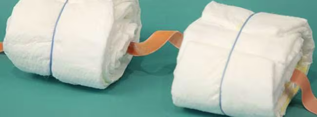 Create the Wheels of the Train Diaper Cake