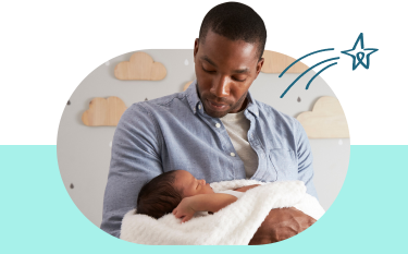 man holding baby