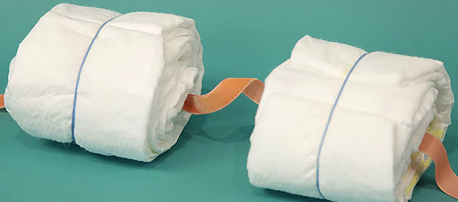 tren seklinde bebek bezi pastasi-Article Content Image 1 Tren şeklindeki Bebek Bezi Pastasının Tekerleklerini Yapın