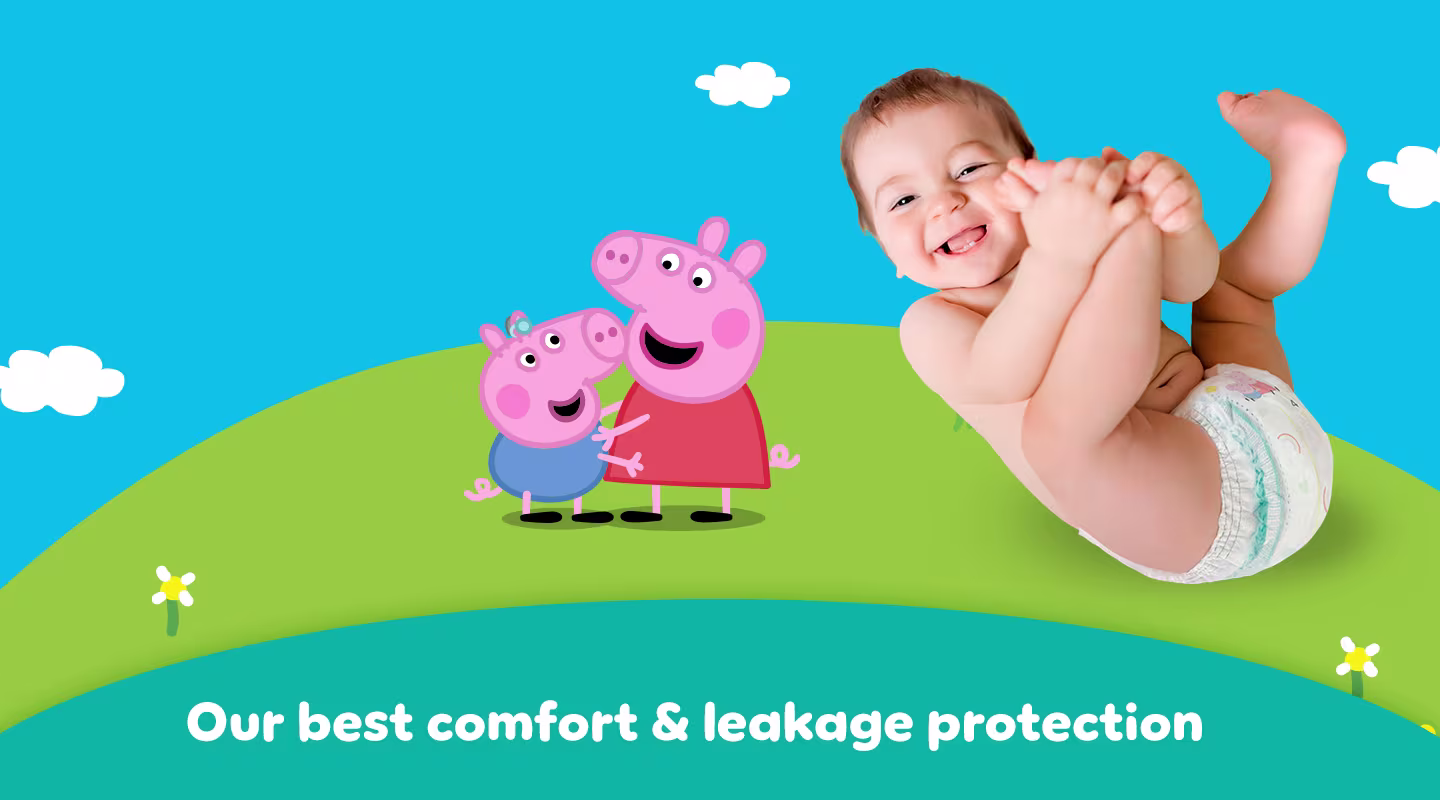 A baby wearing a Pampers nappy pants with Peppa Pig designs