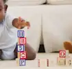 Baby playing with cubes