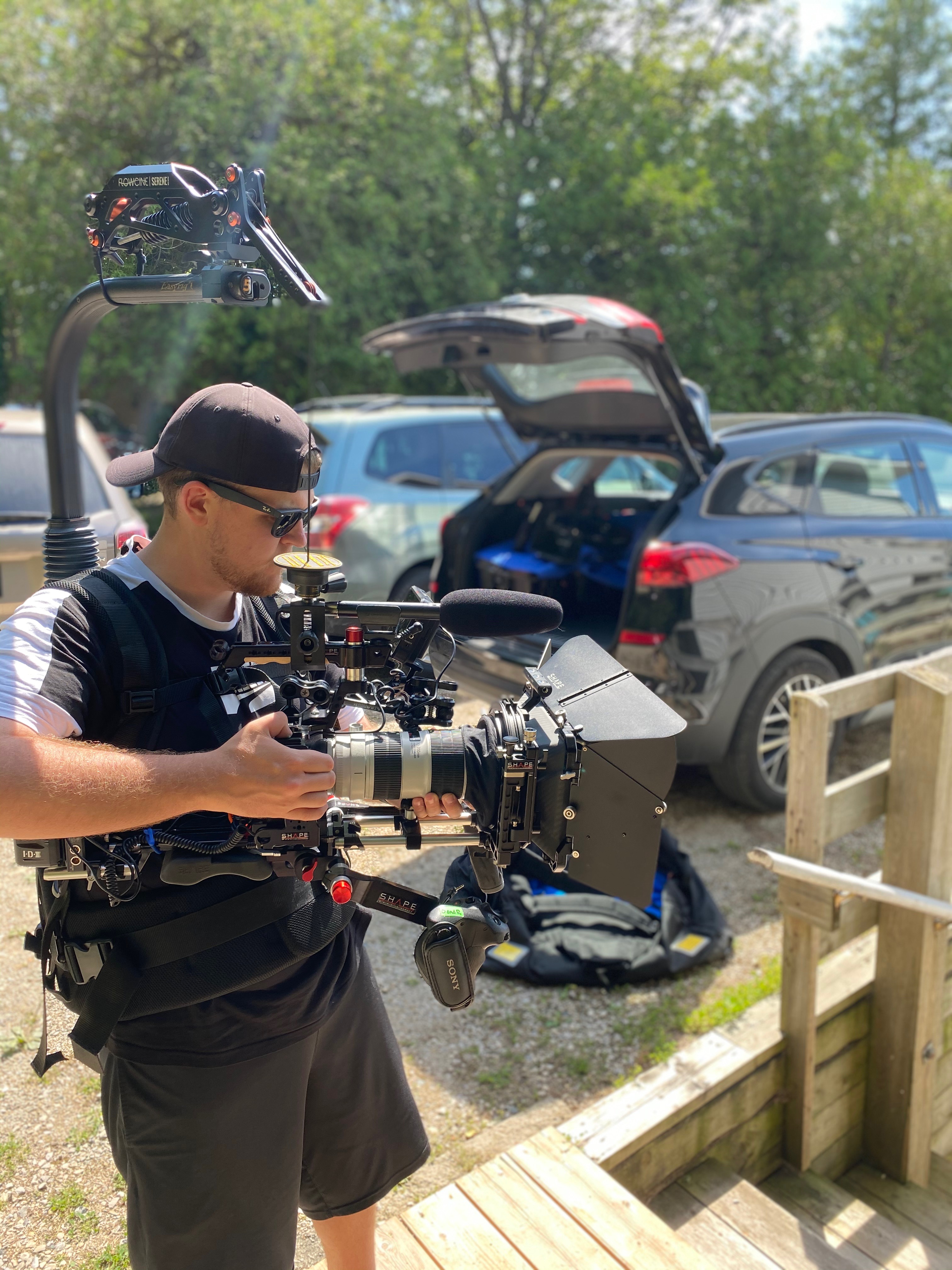 Brandon operating a large camera rig.
