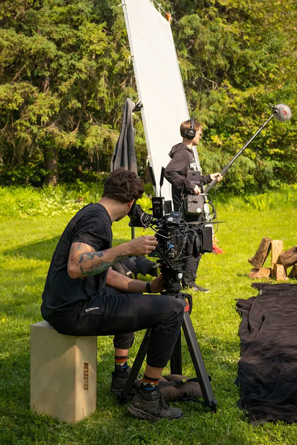 Camera operator and boom operator filming outdoors on the Fairstone Funny Canadian shoot