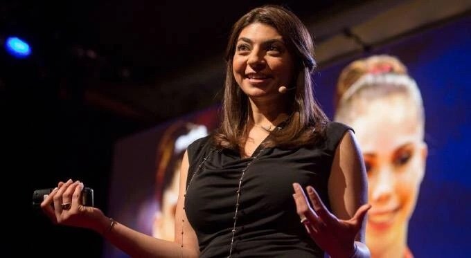 Rana speaking on stage