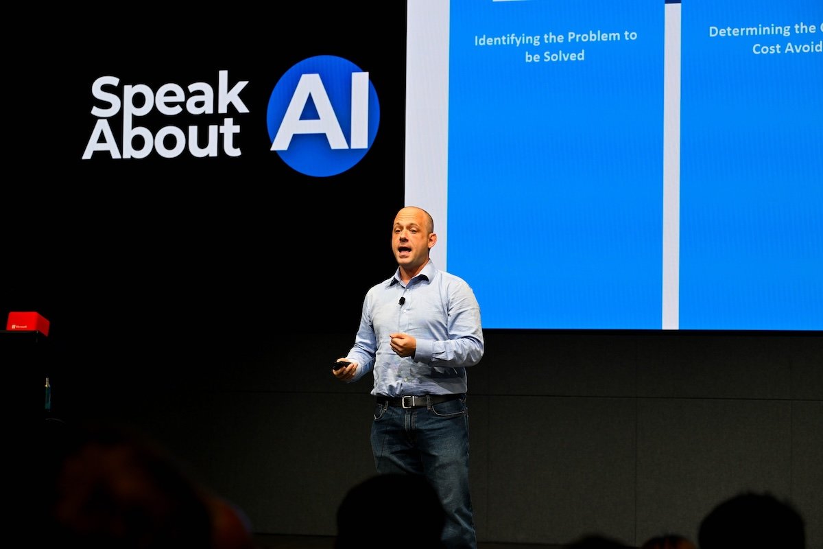 max-sills-speaking-on-stage