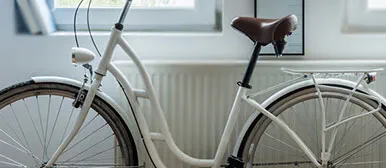 A stylish bicycle positioned within a bright, modern interior, reflecting a lifestyle that prioritises convenience, sustainability and everyday wellbeing. The image represents easy access to local amenities and eco-friendly travel, supporting a balanced way of living for residents in well-connected urban communities.
