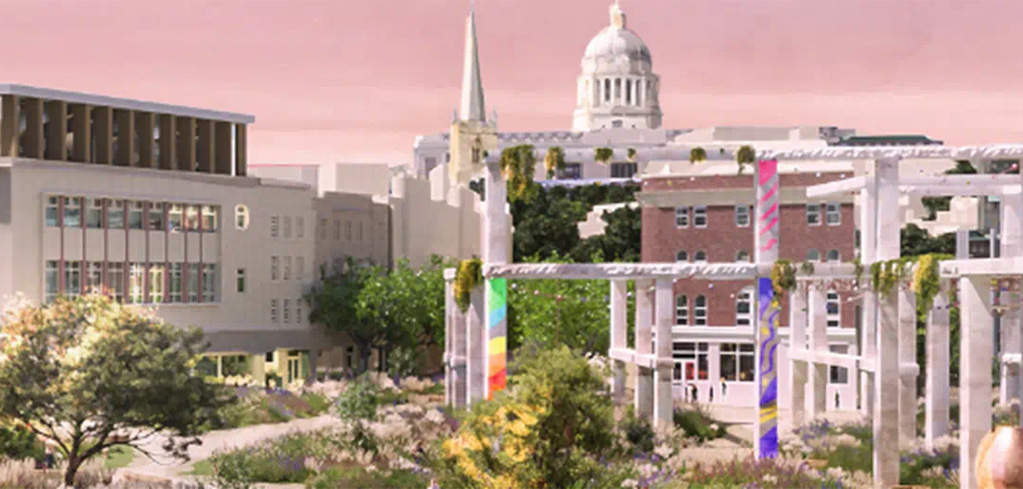 University campus with white columns, colorful pillars, and a domed building in the background under a pink sky.
