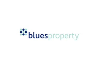 Blues Property logo with blue dots pattern and text in blue and light green colors on white background.