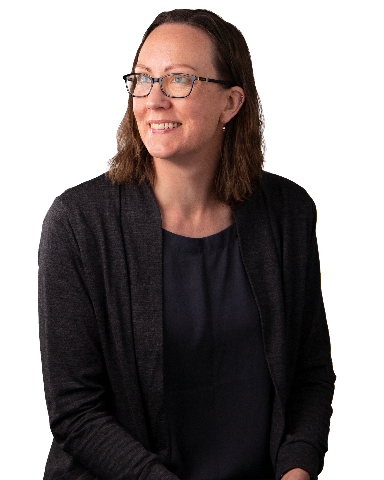 Women wearing glasses and a black shirt, smiling.