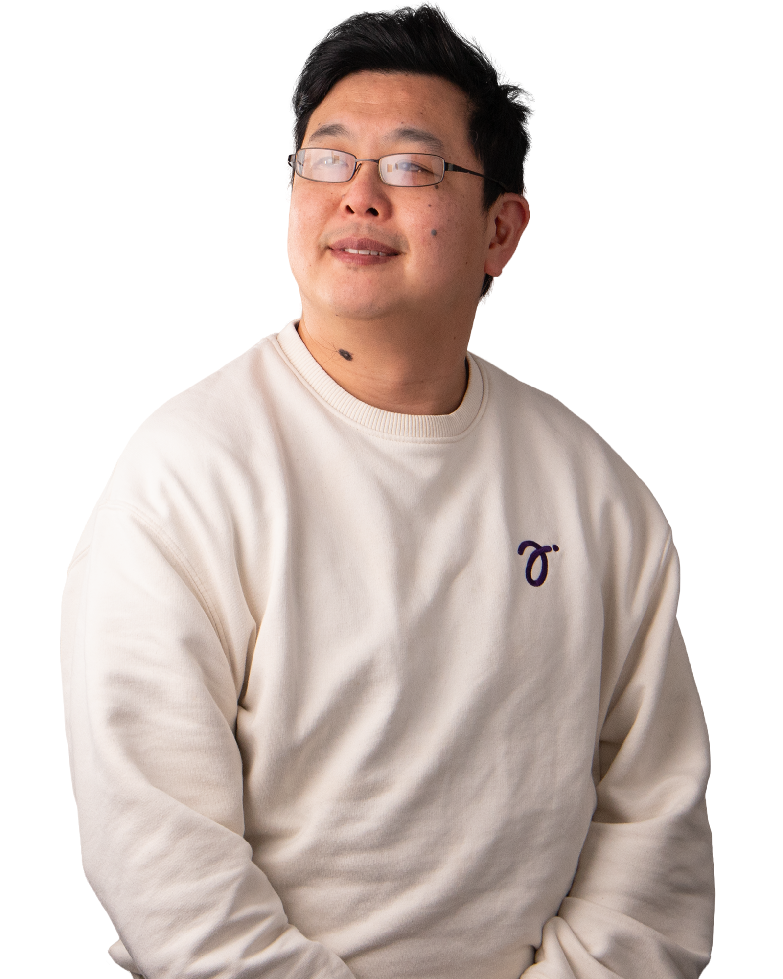 Man with dark hair and glasses wearing a cream jumper