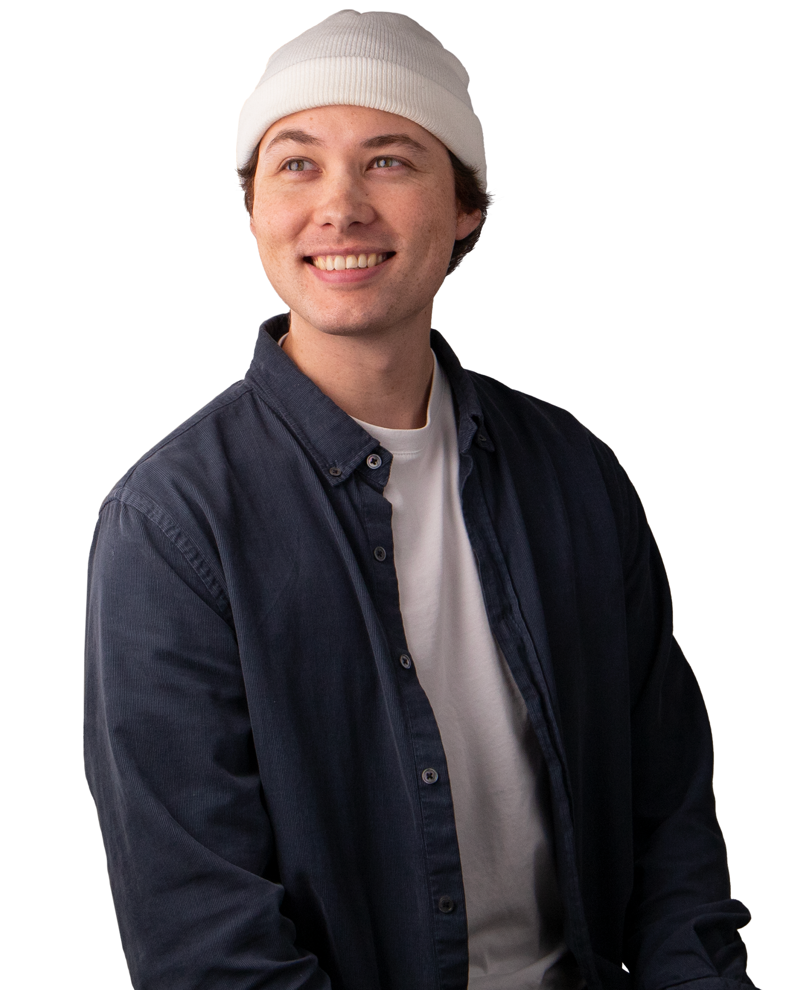 Man wearing a white beanie, dark button up shirt, smiling.