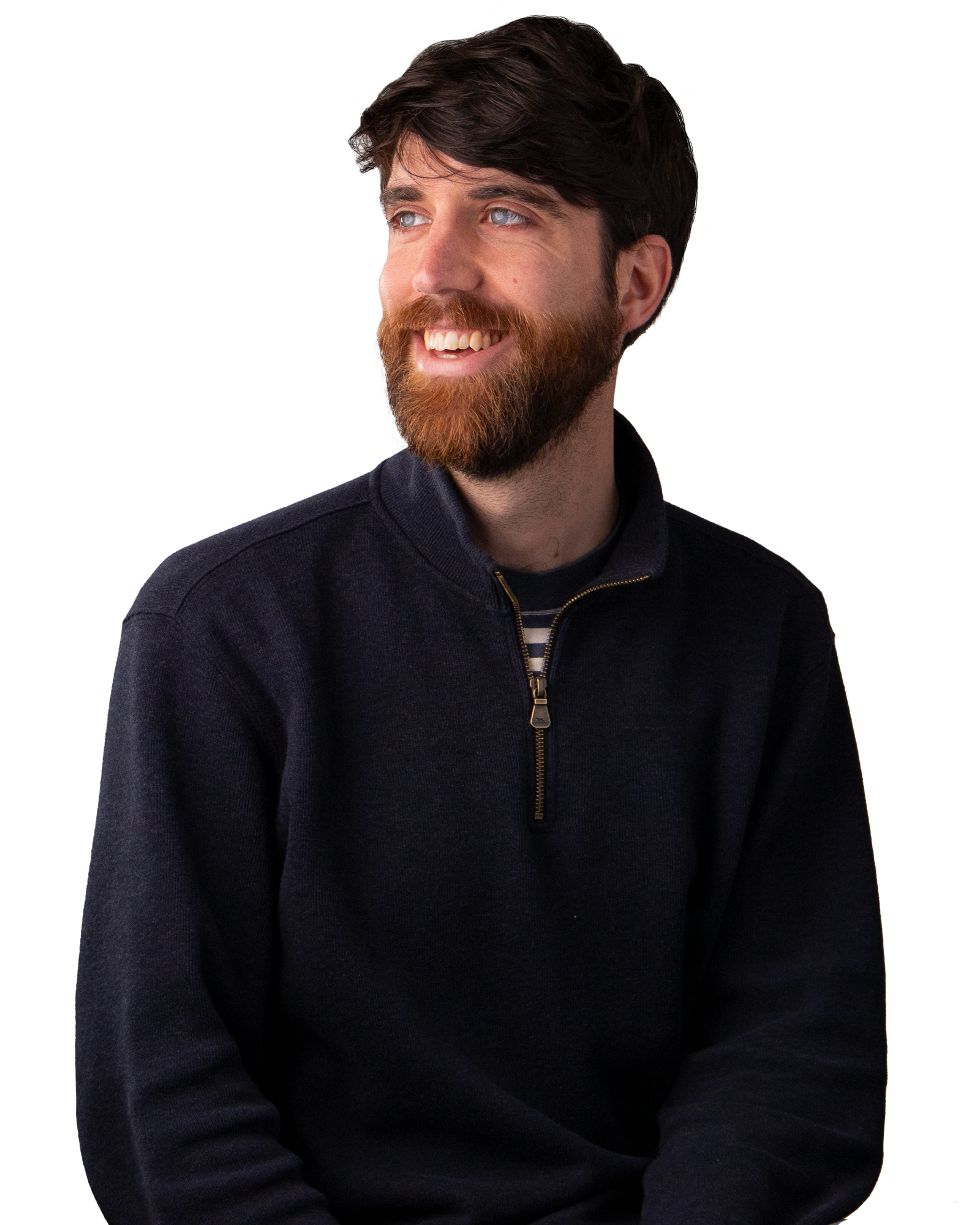 Man with dark hair and beard, smiling.