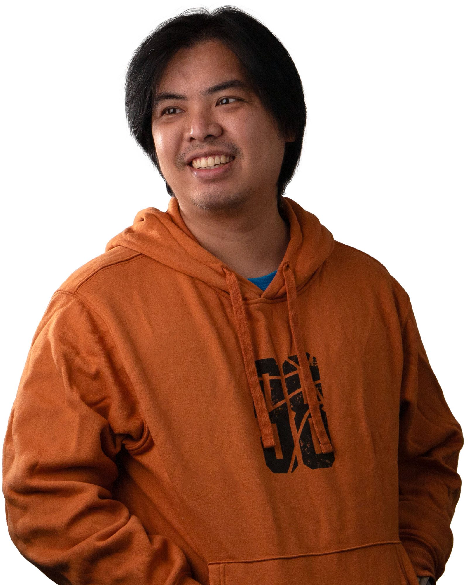 A man with black hair, wearing an orange hoodie and smiling.