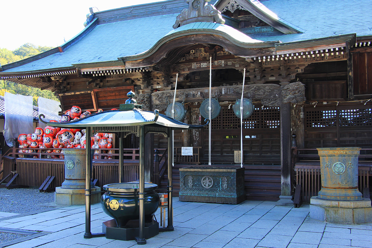 Make a wish upon a Daruma at Shorinzan Daruma-ji Temple in Gunma