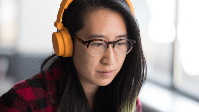 Gender fluid Asian (or Mexican) with headphones