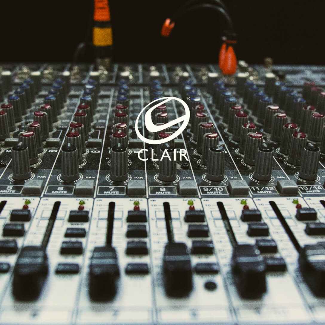 Clair logo over sound engineer board