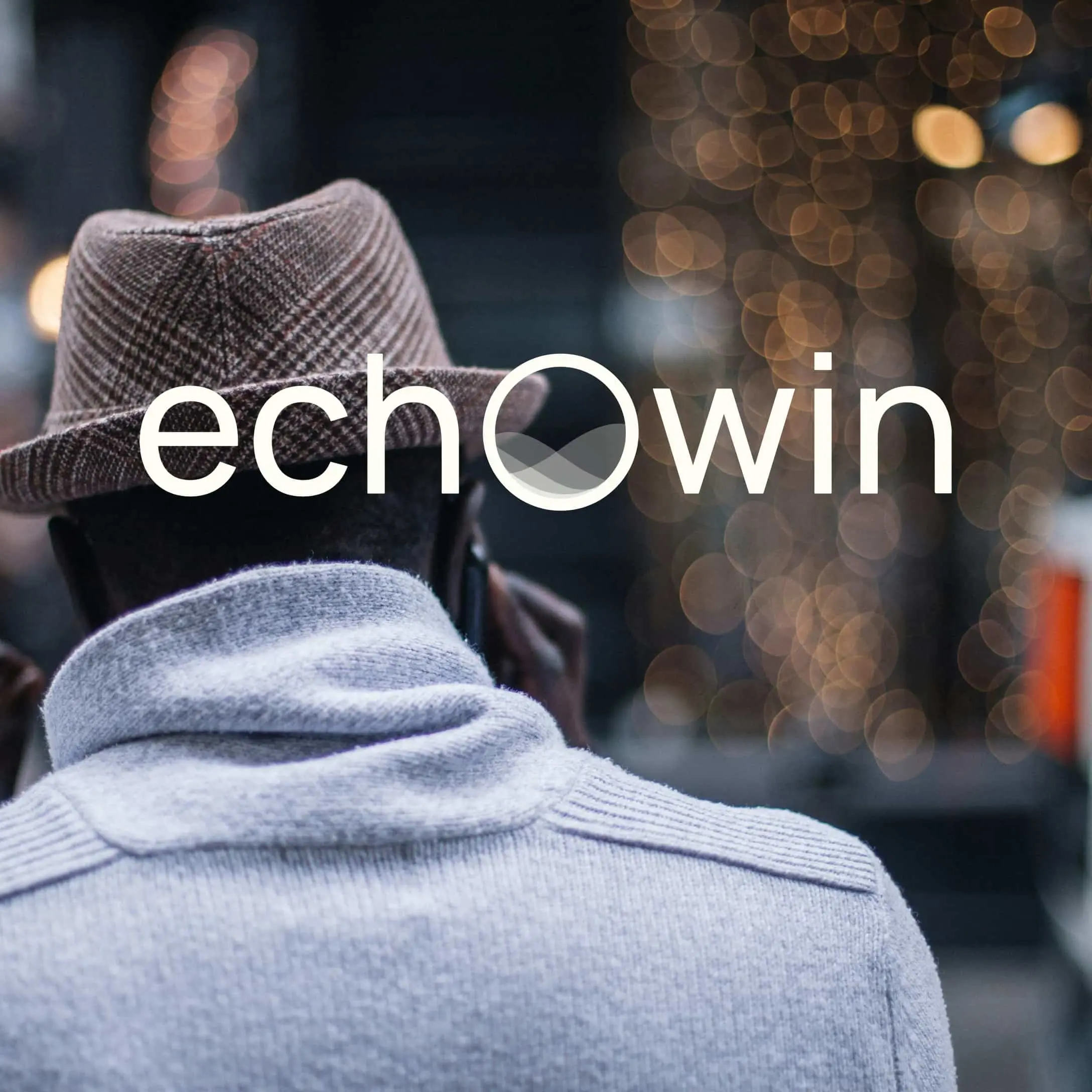 echowin logo and man in a hat talking on his cell phone
