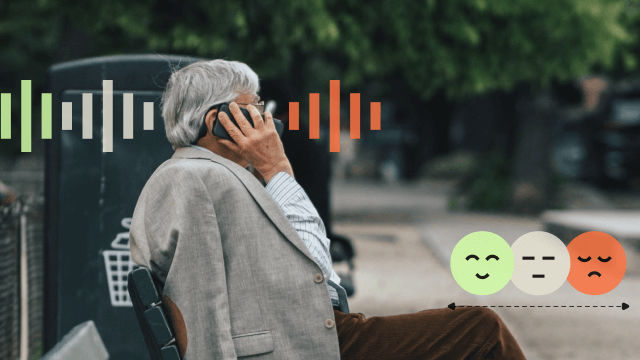 Man takes phone call on park bench