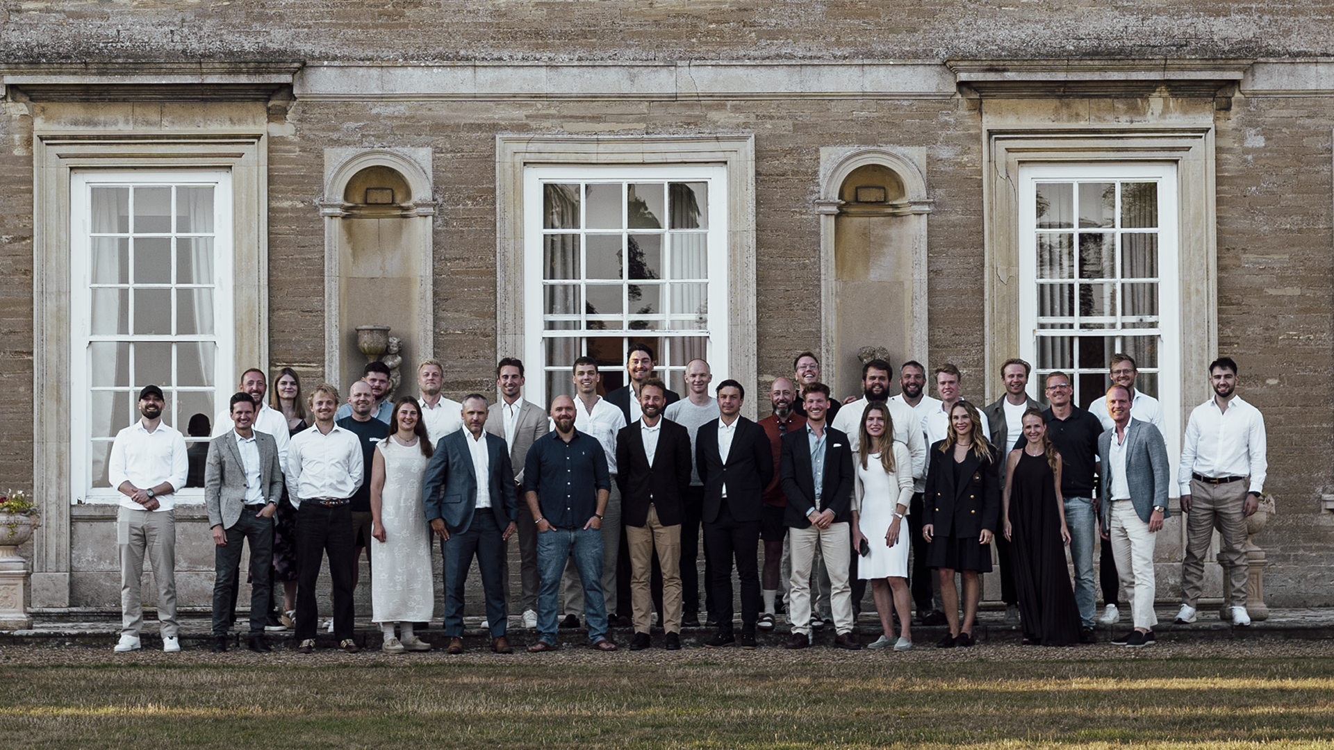 The Bifrost Partners team stands together in a group photo