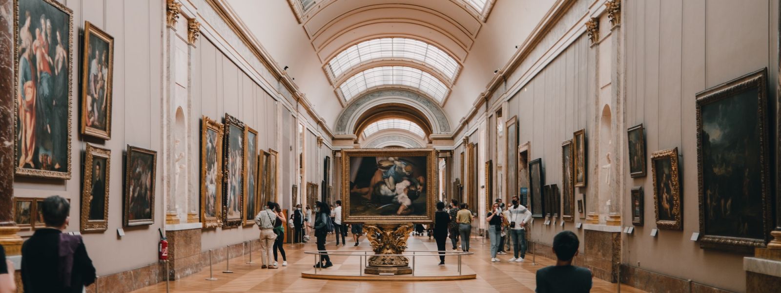 An art gallery with a large curved ceiling
