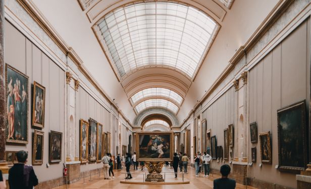 An art gallery with a large curved ceiling