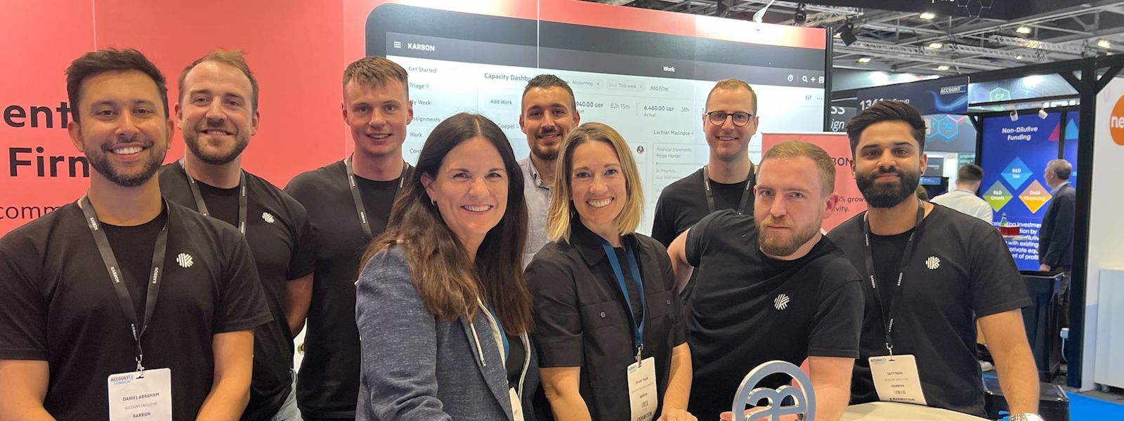 A group shot of the Karbon UK team at Accountex London 2023. They're joined by Karbon CEO, Mary Delaney, and Karbon's Director of Performance Marketing, Tiffany Thain.