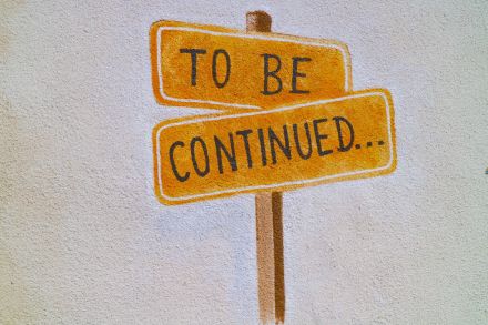 A drawn signpost that reads "to be continued..."