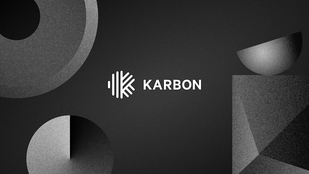 A monochromatic and geometric background with the Karbon logo prominently displayed.